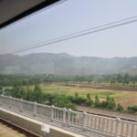 Landscape view from inside train